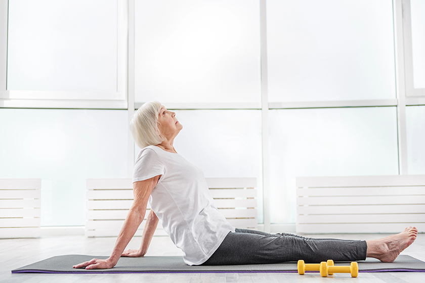 serene-old-woman-exercising